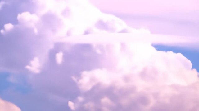 A dreamy pastel sky with a massive, soft cloud formation featuring a smooth, flat top