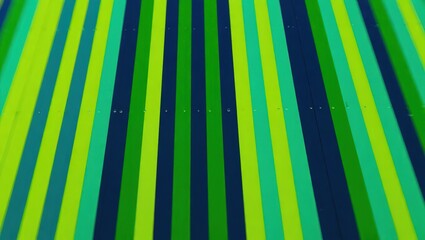 Vibrant Green and Blue Vertical Striped Pattern Background.