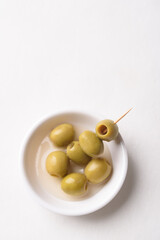 Fresh olives pickled on white background