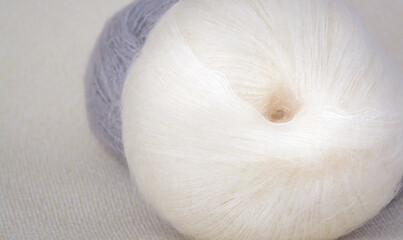 Mohair yarn in a ball on a blurred background