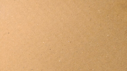 Old Kraft paper texture box craft stripes pattern. top view.
Abstract brown recycled paper background. 