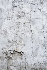 Obraz premium Close-up of a rough, textured, weathered, white wall