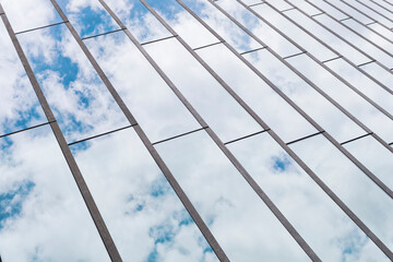 Glass wall Facade Stripe pattern Sky reflection Modern building exterior Architecture details Abstract background