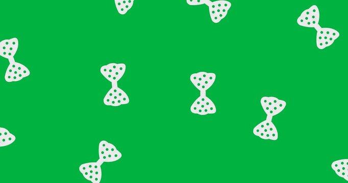 Multiple bow tie icons with polka dots pattern falling against copy space on transparent background
