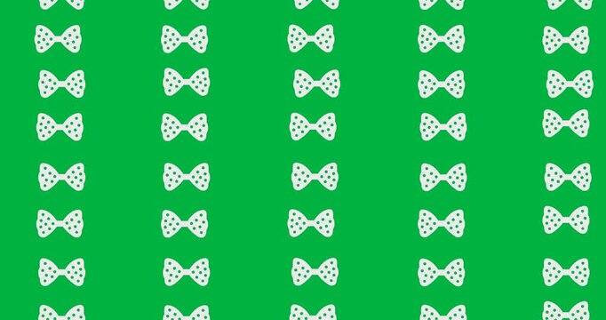 Multiple bow tie icons with polka dots pattern in seamless pattern against transparent background