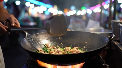 Street Food Chef Cooking Asian Dish Wok Stir Fry At Night Market - Powered by Adobe
