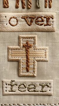 Embroidered 'Faith Over Fear' message with a cross symbol