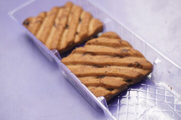 Hide and Seek chocolate biscuits are crunchy, delicious cookies loaded with rich chocolate chips, offering a perfect blend of sweetness and crunch