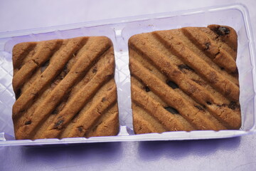 Hide and Seek chocolate biscuits are crunchy, delicious cookies loaded with rich chocolate chips, offering a perfect blend of sweetness and crunch
