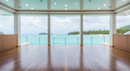 Obraz premium Spacious empty room with large windows overlooking a tropical ocean view for commercial usage and mockups