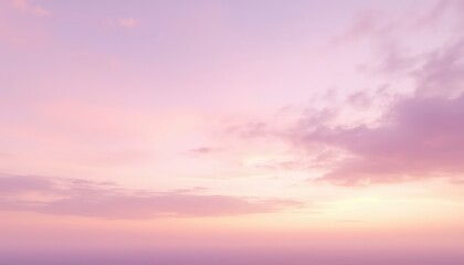 Obraz premium Gentle pastel gradients blend across a serene sky, the delicate clouds painted in shades of pink, lavender, and soft peach.