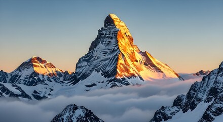 Majestic Snow-Covered Mountain Peak at Sunrise with Clouds Below