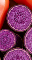 
Macro Close-Up of Sliced Purple Ube Yam and Pile of Pink-Purple Sweet Peppers – Vivid Root Vegetable Texture.close up of a pile of pink and purple sweet pepper, Macro shot of sliced purple ube yam 