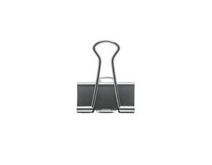 A single, metallic binder clip isolated against a stark black background