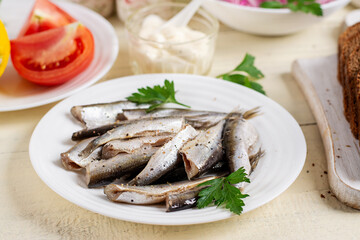 Ingredients for sandwiches with anchovies, onions, and tomatoes. Diet food. Delicious food.