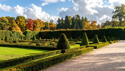 Beautiful Formal Garden with Green Hedges and Colorful Trees in Autumn