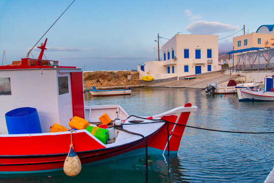 Tranquil Water Scene with Lighthouse and Fishing Boat in Kasos island