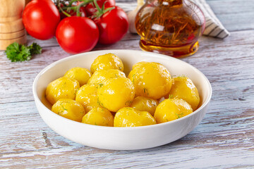 Boiled young potato with oil
