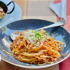 Spaghetti bolognese with parmesan cheese