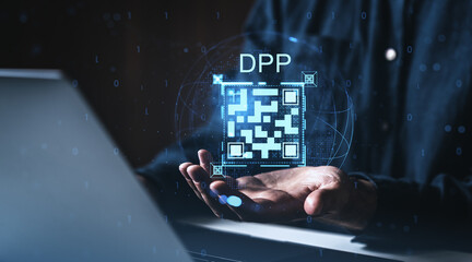 Digital product passport concept with glowing QR code in male hands above laptop, futuristic technology interface on dark background with binary code.