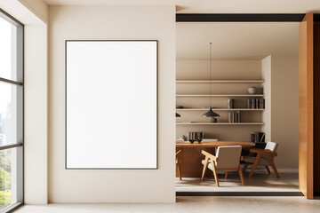 Fototapeta na wymiar Modern interior with blank poster mockup on beige wall next to stylish workspace and bookshelf in natural light minimalist setting. 3D Rendering