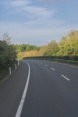 The scenery of the winding highway at the foot of the mountain