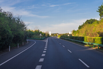 The scenery of the winding highway at the foot of the mountain