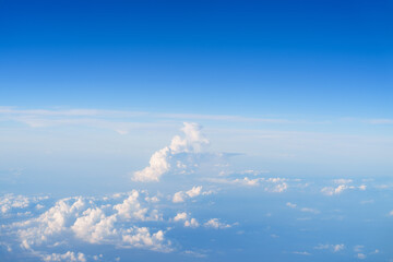 Overlooking the blue sky and white clouds above the clouds