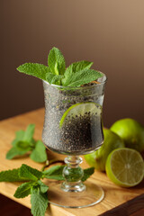 Diet vegan cocktail with chia seeds, lime, and mint.
