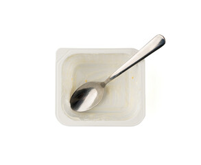 Empty yogurt cup isolated, yoghurt with orange fruits pieces in plastic pot, milk pudding container