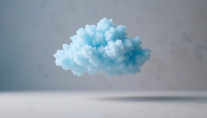Pastel blue cotton candy cloud floating above neutral surface.