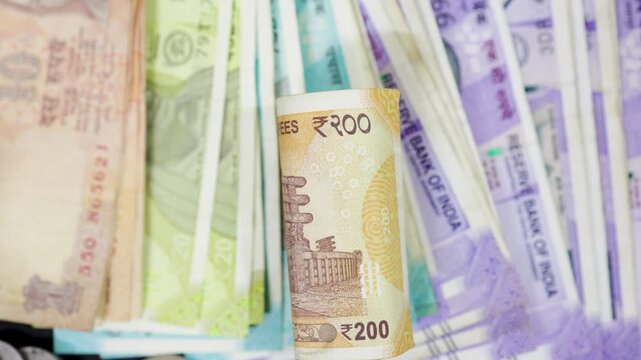 Close Up Of two hundred rupee Indian note On a blurred note Background