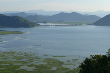lake and mountains, Skadar lake surrounded by mountains in morning