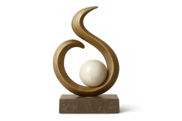 Abstract gold swirl sculpture holding marble sphere
