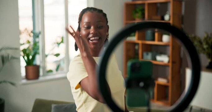 Influencer, woman or dancer with phone in house for live stream, social media post or video production. Content creator, ring light or black person with mobile, dance challenge or tutorial for viewer