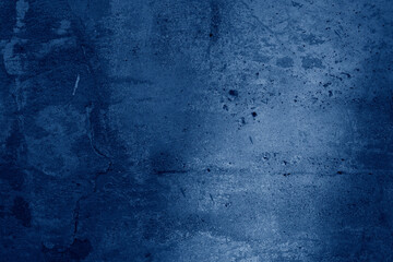 Deep blue grunge texture with cloudy details and a rough painted surface.