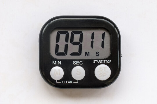  Small digital timer-stopwatch with black and white display and battery life. The display shows 09 minutes 11 seconds.
