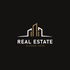 Real estate logo design with modern building silhouette for property, construction, and architecture branding