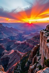 Spectacular sunset over the Grand Canyon's North Rim, viewed from Cape Royal's Wotans Throne. Vast, colorful landscape, layered rock formations, dramatic light, overlook, North Rim