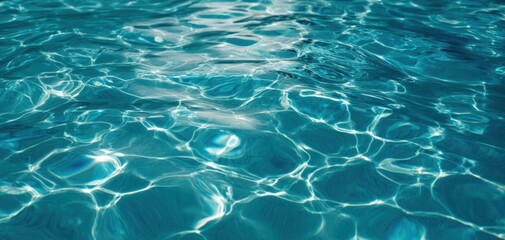 The Water Surface Glowing with Sunlit Ripples in a Turquoise Pool