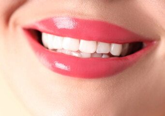 Obraz premium Woman with beautiful lipstick on her lips, macro view