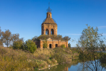 Ruins of Transfiguration Church in Zherdevo, Tula region, reflected in water
