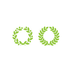 Two bright green wreaths composed of leaves on a white background
