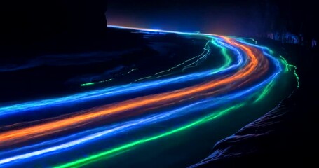 Abstract neon light trails create a vibrant and dynamic background, ideal for futuristic design - Powered by Adobe