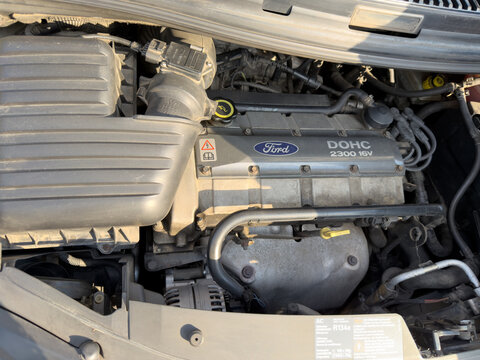 Close-up of a ford engine in an automotive setting