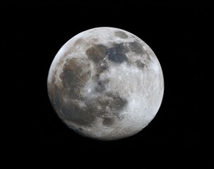 Obraz premium A full moon is shining very brightly in the night sky tonight