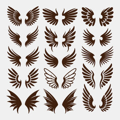 Fototapeta premium Collection of brown stylized wings on a light gray background graphic