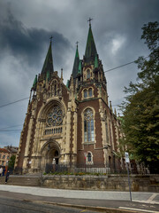 Neo Gothic Polish cathedral Olga and Elizabeth in Lviv city spires under dramatic skies