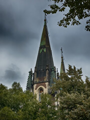 Obraz premium Neo Gothic Polish cathedral Olga and Elizabeth in Lviv city spires under dramatic skies