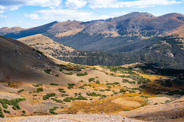 Scenic view seen from Alpine visitor center in Rocky Mountain National Park, Estes Park, Colorado, USA. Alpine ridge trail landscape during fall foliage or autumn season